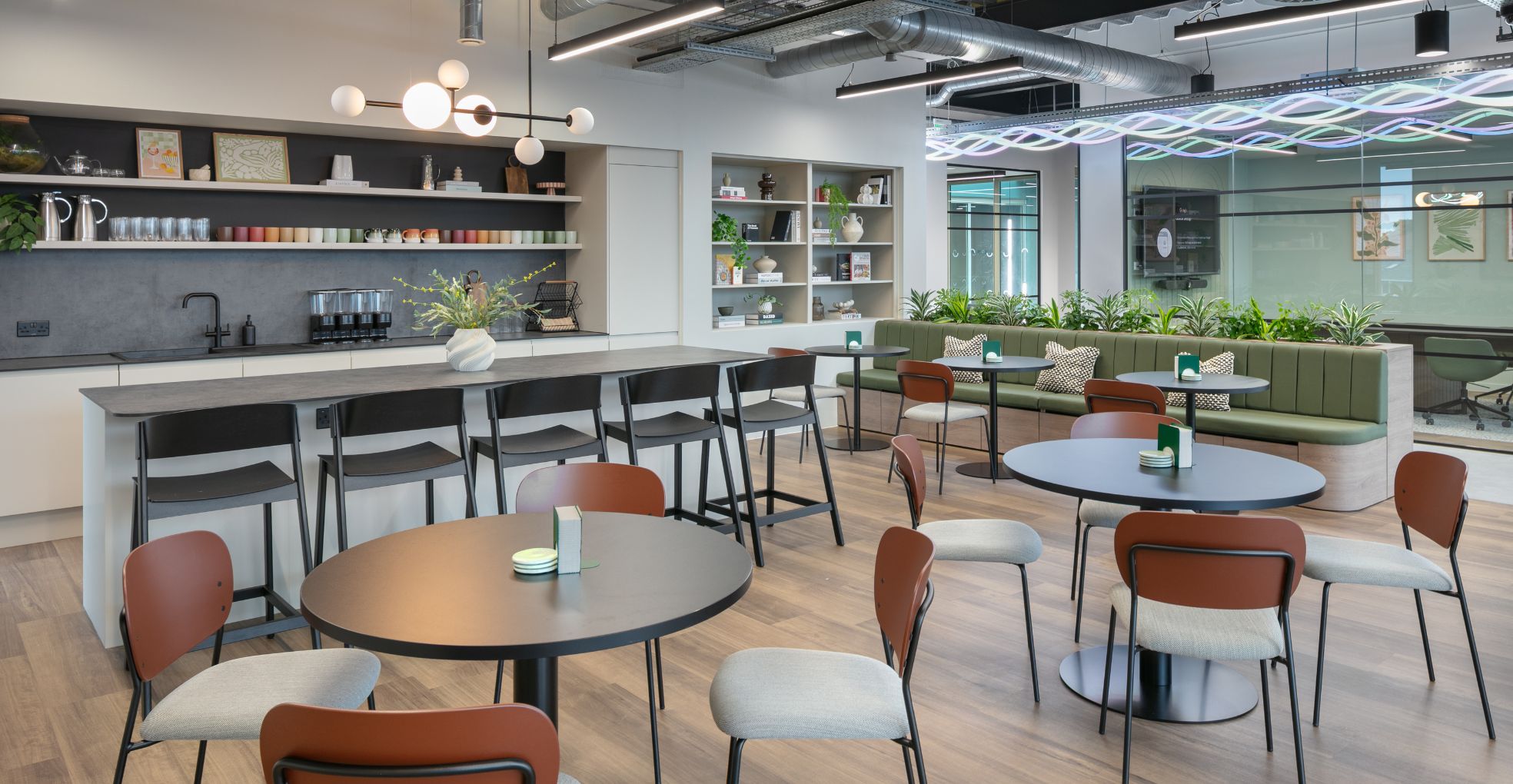Modern office canteen with teabar, breakout seating and